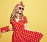 A Little Girl in a Red Color Dress With Polka Dots Image